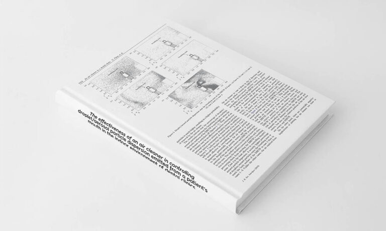 The Effectiveness of an Air Cleaner in Controlling Droplet/Aerosol Particle Dispersion